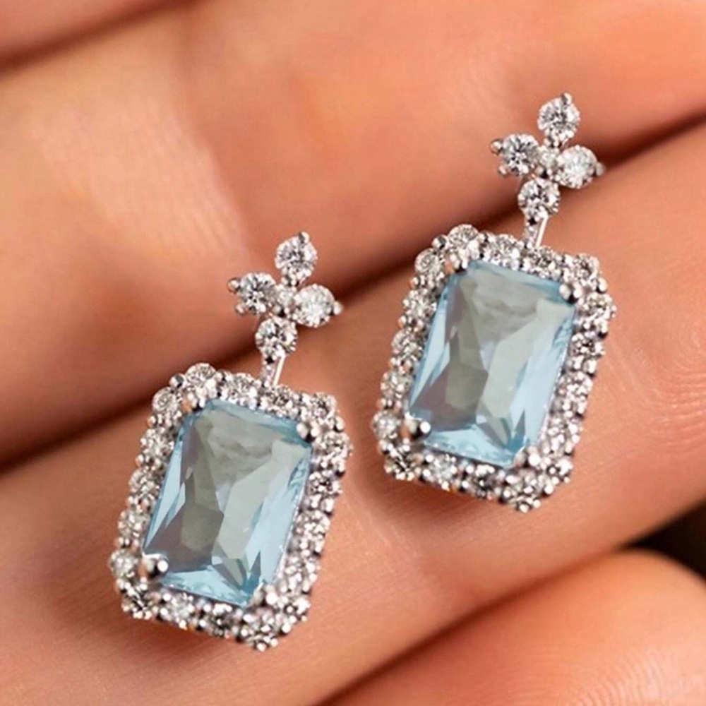 Light Blue Simulated Gemstone, Embedded With simulated diamonds Stud Earrings